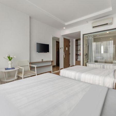 Dn Beach Hotel Da Nang Bagian luar foto