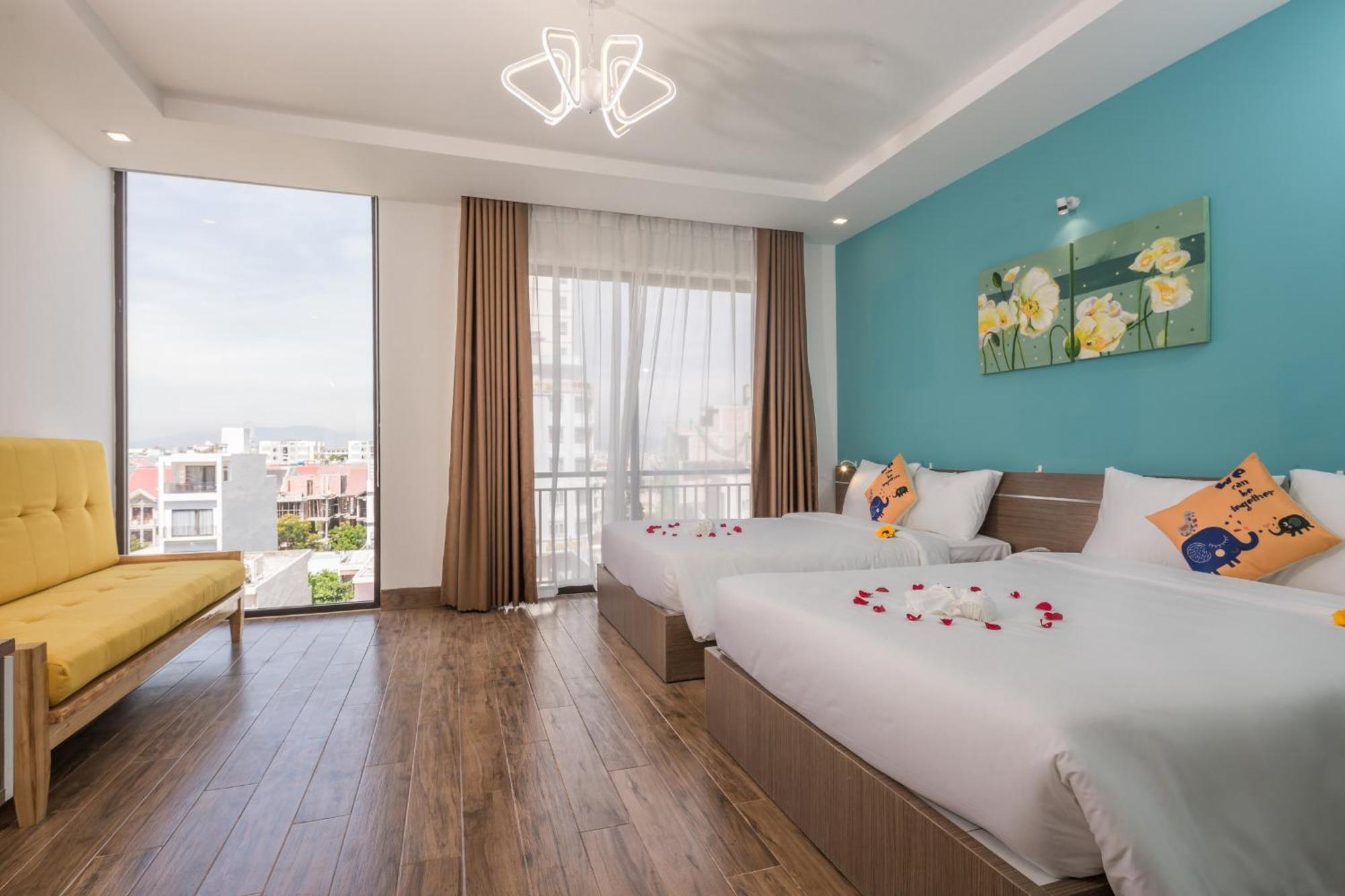 Dn Beach Hotel Da Nang Bagian luar foto