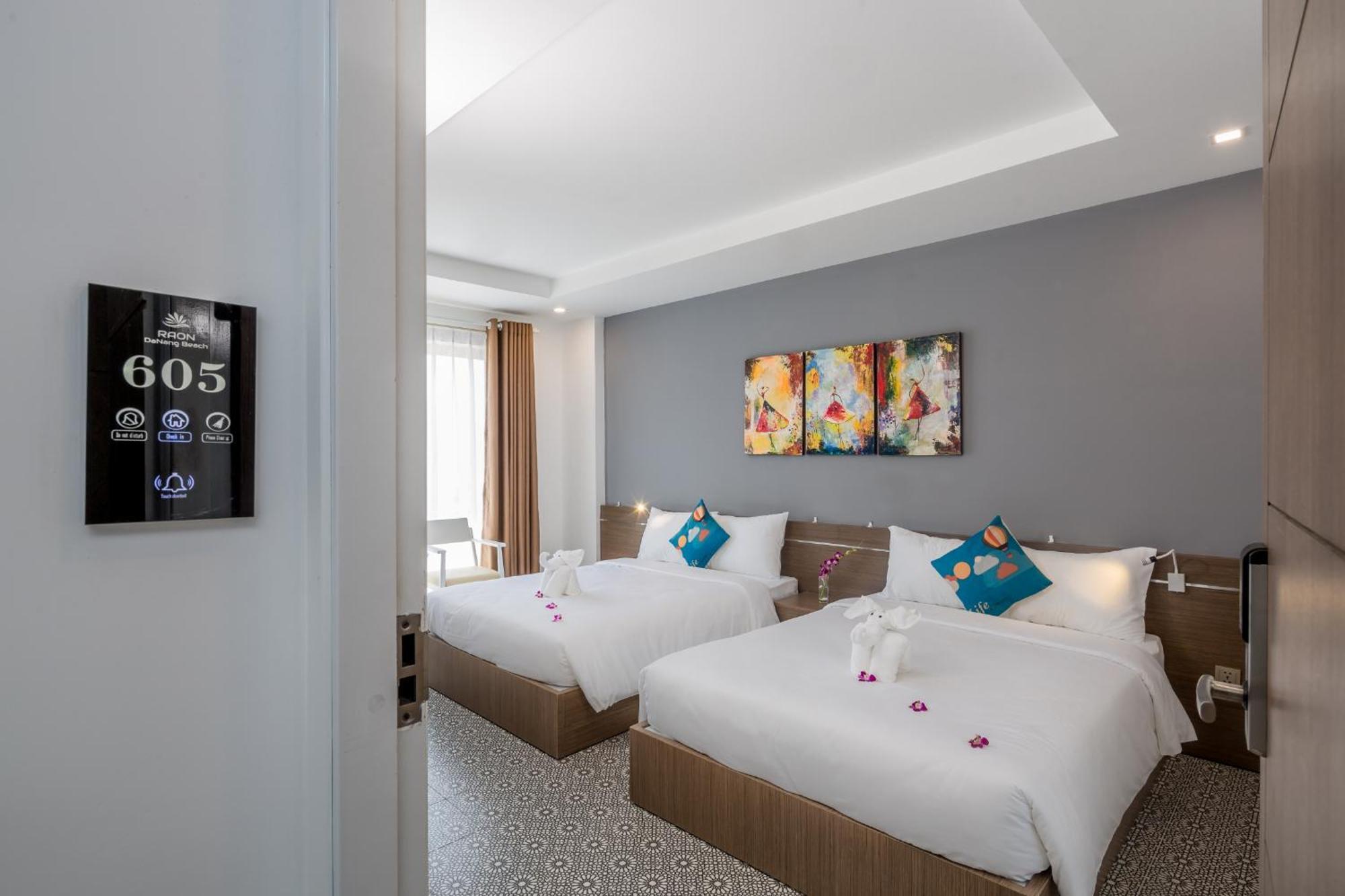 Dn Beach Hotel Da Nang Bagian luar foto