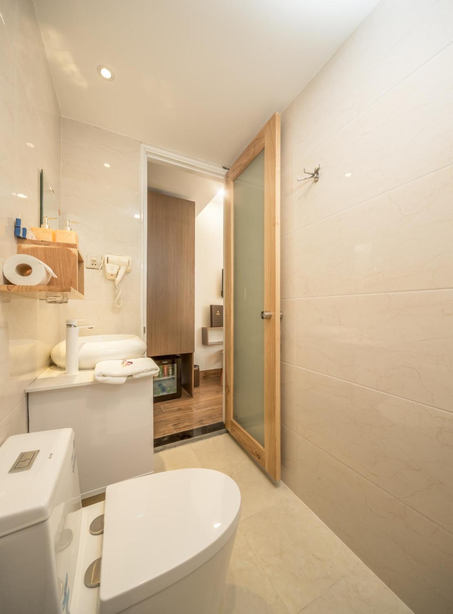 Dn Beach Hotel Da Nang Bagian luar foto