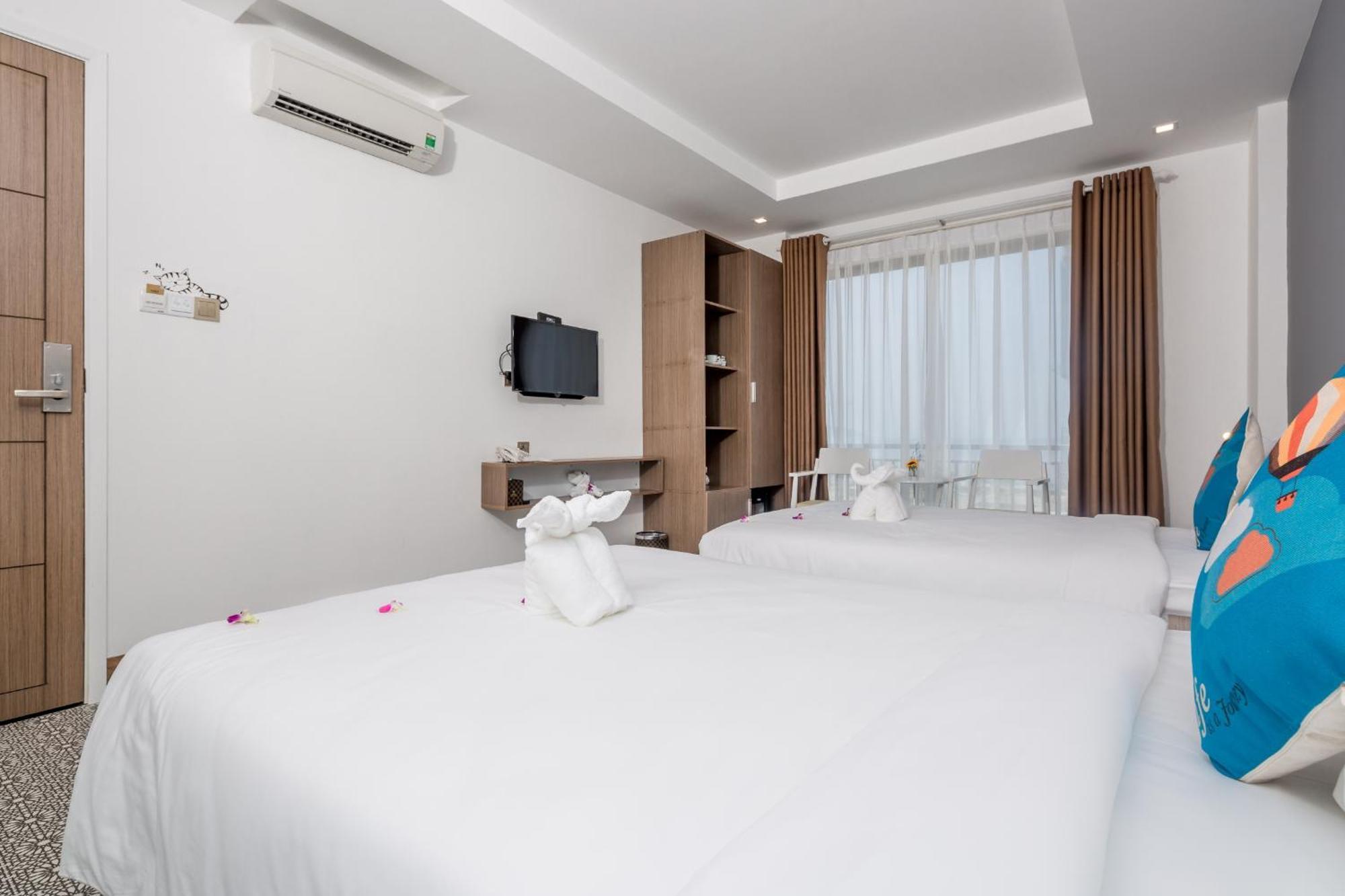 Dn Beach Hotel Da Nang Bagian luar foto